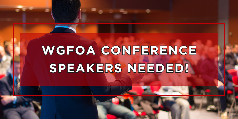 Banner image of a person speaking to an audience in a conference room, with bold text across the center reading ‘WGFOA Conference Speakers Needed!’ in a red overlay.